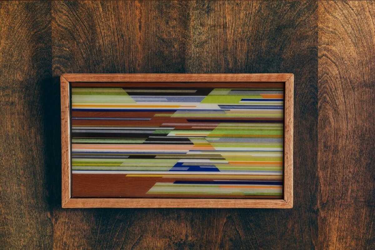 Layered resin panel in green, orange and blue