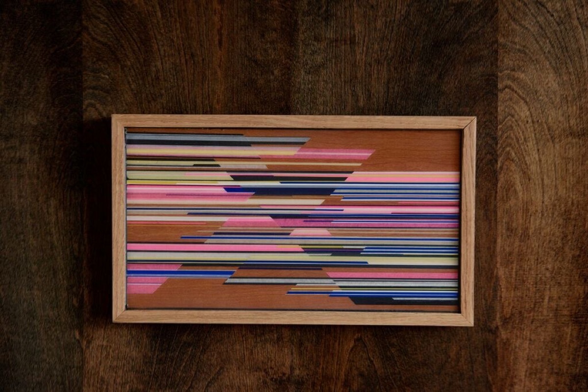 Layered resin panel in pink, blue and green
