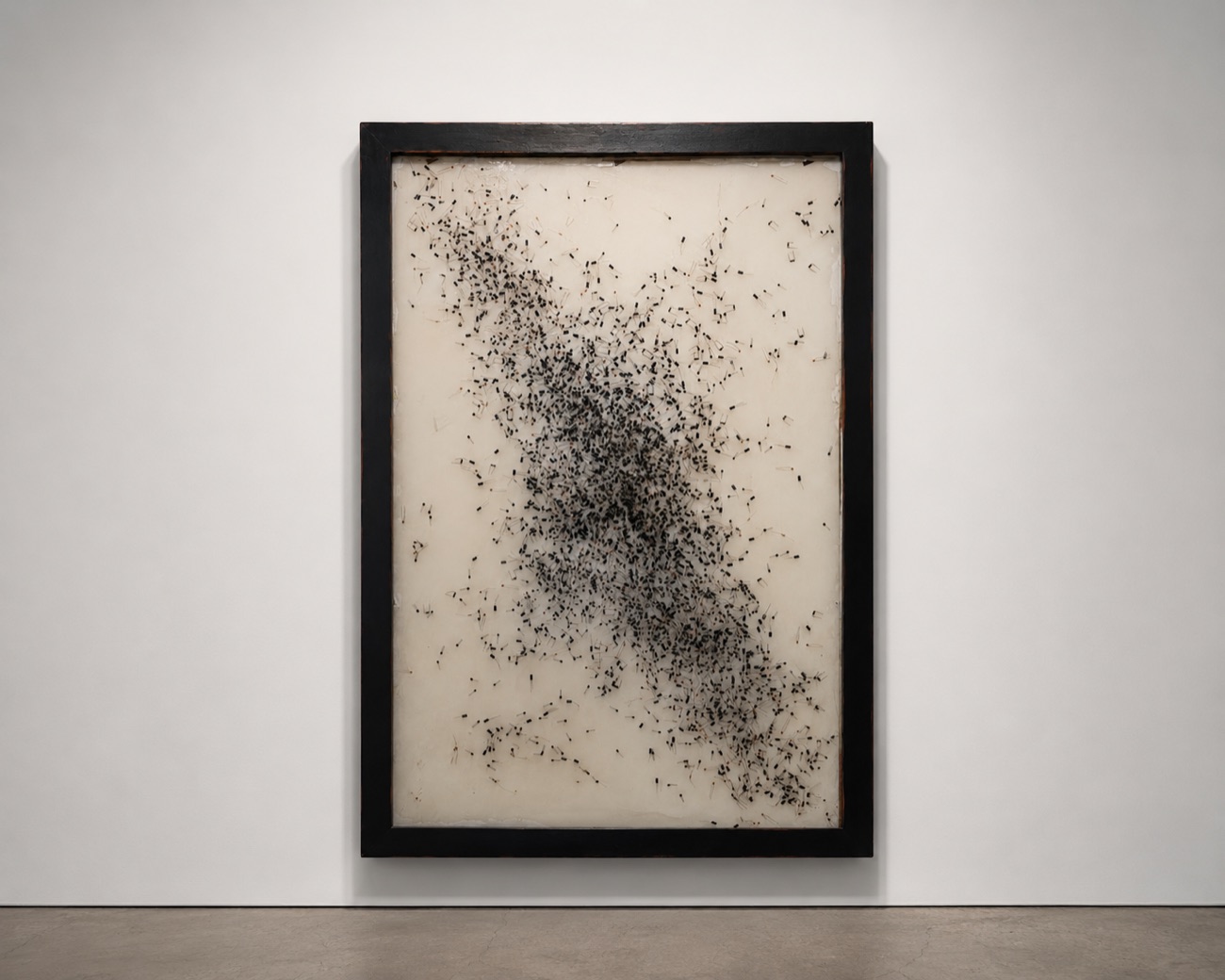 Large framed resin artwork, dense black field on cream